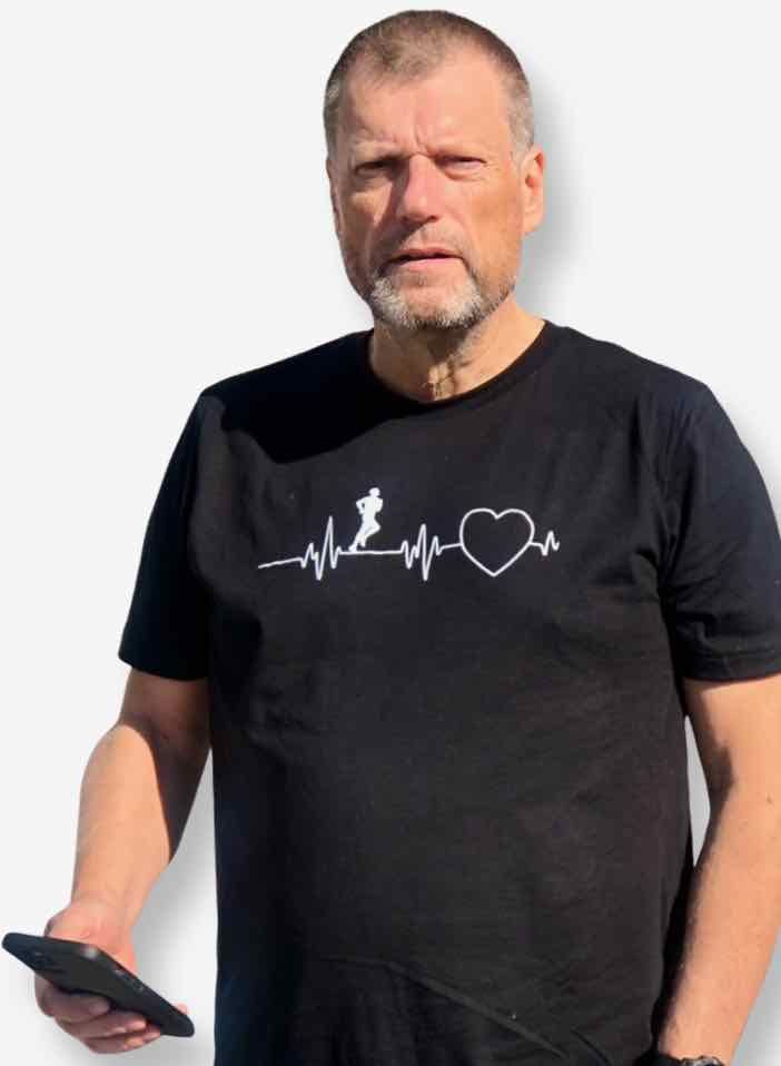 Love of Running Tshirt features a silhouette of a person running along an ekg line towards a heart